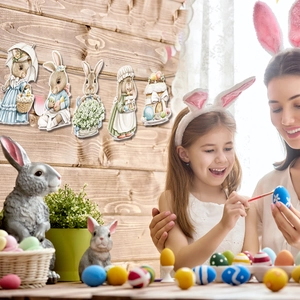 Detail of Easter party banner with vintage rabbit designs in a family DIY scene