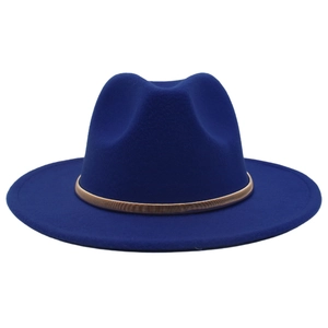 Detailed close-up of a royal blue wool fedora with a gold metallic band and flat brim