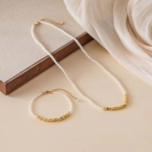 Detailed set of freshwater pearl necklace and bracelet with 14k gold plated cuban links