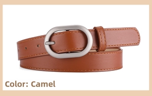 Close-up of camel PU leather belt featuring a polished silver oval buckle