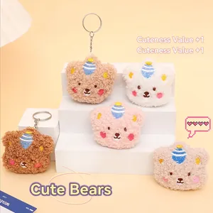 Set of five cute plush bear keychains in assorted colors with striped hats and metal rings