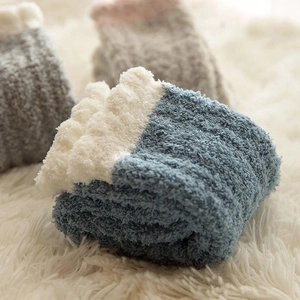Thick coral fleece crew socks for women in grey-blue with soft fuzzy texture