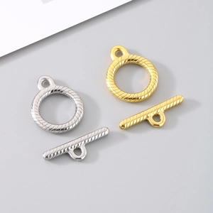 Detailed view of gold and silver stainless steel OT toggles with twisted rope texture