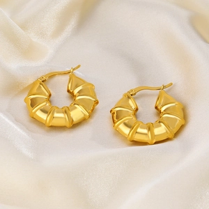 18K gold plated hollow bamboo texture hoop earrings in stainless steel on silk
