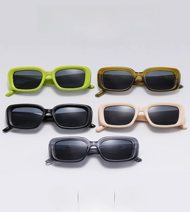 Detail of colorful rectangle sunglasses with thick frames and UV protection lenses