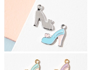 Detailed view of colorful alloy high heel charms with heart accents for DIY jewelry making
