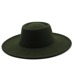 Detail of dark green wool felt hat with a 9.5cm wide brim and textured matte finish