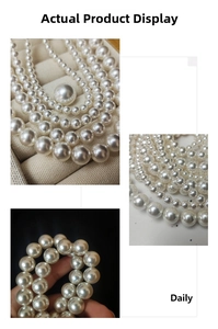 Detail shot showing multiple sizes of high-luster white glass pearls in stacked layers
