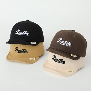 Set of four Boston embroidered soft brim cotton baseball caps for kids in neutral tones