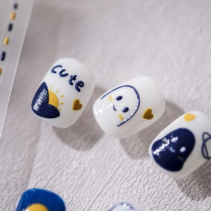 Japanese style thin nail stickers with blue and yellow graffiti art on white base