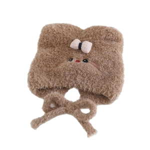 Cute brown plush cat hat for girls featuring a pink bow, ear flaps and chin straps