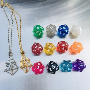 Golden and silver mesh cage pendant necklaces with a set of 12 colorful D20 resin dice