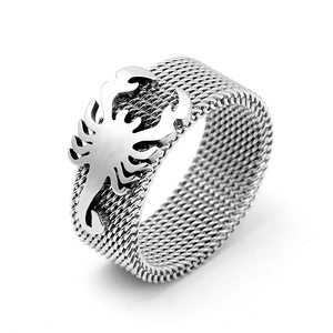 Macro shot of a 316L stainless steel ring featuring mesh texture and a 3D scorpion detail