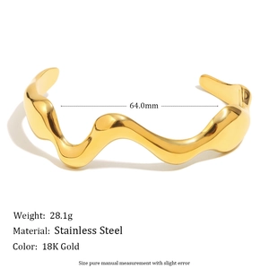 Polished 18K gold plated stainless steel wave bangle with a 64mm inner diameter