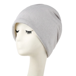 Chic grey-white marled knit beanie hat with fine textured finish for winter fashion