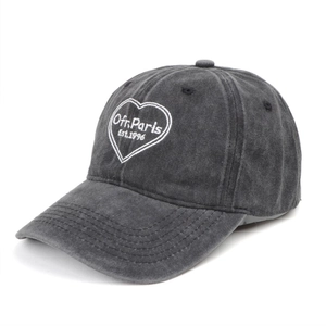 Detail of Ofr. Paris heart embroidery on a vintage washed cotton dark gray baseball cap