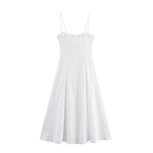 White embroidered hollow out corset midi dress with spaghetti straps in a flat lay view