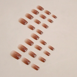 Elegant red-brown gradient press-on nails with silver glitter in a square-oval shape