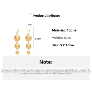 Detail of gold metal ball earrings showing measurements and triple bead vertical drop