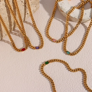 Golden 6.5mm Cuban chain necklace set with colorful rectangular zirconia gemstones