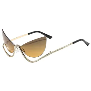 Fashionable cat eye semi-rimless sunglasses with gold frames and gradient brown lenses