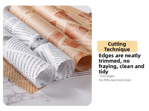 Detail shot of newspaper style food wrapping paper rolls showing precise cutting edge