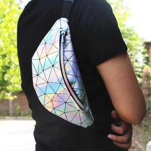 Outdoor shot of a geometric laser sequin waist bag with adjustable strap for women