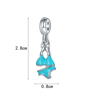 Detailed view of silver and blue enamel bikini charm pendant with dimensions 2.8x0.8cm