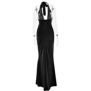 Detailed back view of a black halter maxi dress showing the open back and elegant ruching