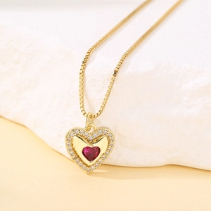 18K gold plated heart pendant necklace with red gemstone and zircon on white stone