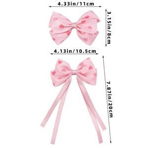 Detailed dimensions of pink heart-patterned hair bows with and without streamers