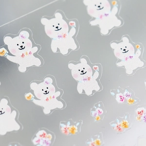 Pro thin adhesive nail art stickers featuring cute white bears and colorful floral patterns