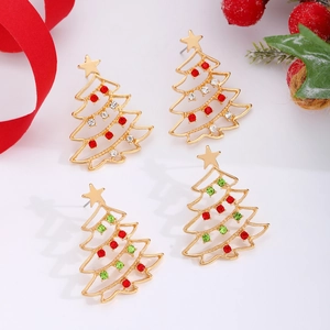 Golden Christmas tree stud earrings with sparkling colorful rhinestones on festive background