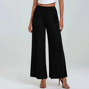 Detailed shot of high-waisted black wide-leg pants featuring functional large side pockets
