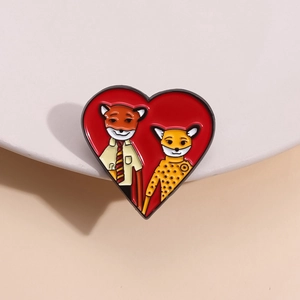 Fantastic Mr. Fox heart-shaped enamel pin badge with fox couple on white ceramic plate