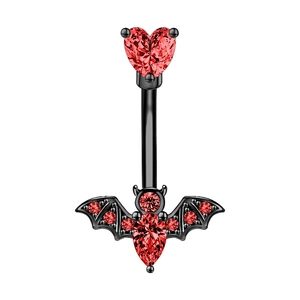Detailed view of black bat belly ring with vibrant red heart gemstone in centered close-up