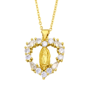 Golden Virgin of Guadalupe heart necklace with cubic zirconia on white background