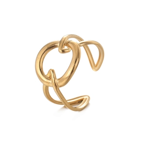 Detailed view of irregular geometric hollow ring with golden stainless steel finish