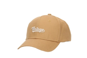 Detail of white Vintage embroidery on khaki cotton twill outdoor baseball cap
