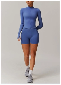 Blue quick-dry yoga set featuring zip-up stand collar top with thumbholes and high waist shorts