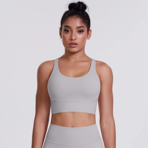 Detail of light grey ribbed sports bra and high-waisted leggings in soft brushed fabric