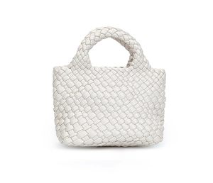 Detailed view of hand-woven leather bucket bag with premium cream white texture and craftsmanship