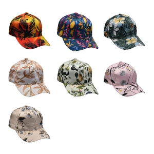 Variety of printed baseball caps with tropical Hawaiian palm and floral patterns