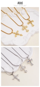 Detail of colorful zircon cross pendants with elegant flat snake chain in gold and silver