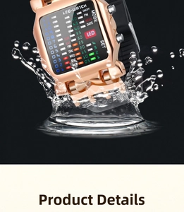 Detail shot of rose gold LED binary watch displaying colorful matrix lights in water splash