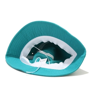 Teal cotton bucket hat with interior view showing adjustable drawstring and sweatband