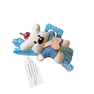 Cute teddy bear hair clip in denim overalls with blue and white plaid fabric bow base