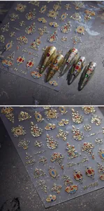 Detail of 3D embossed bohemian court style nail stickers with gold outlines and jewel patterns