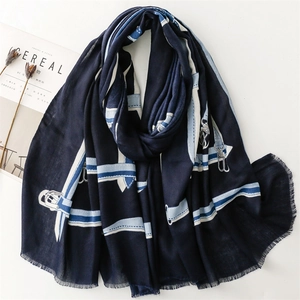 Navy blue cotton linen shawl with horse bit belt pattern and fringe details