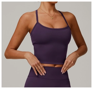 Detail of dark purple high-stretch brushed yoga vest and leggings on a female model